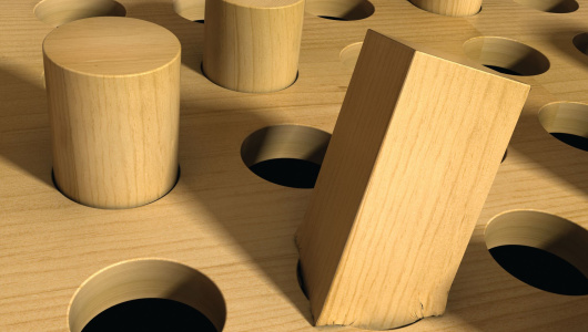 A square peg forced into a round hole.