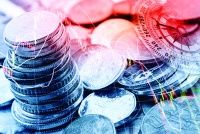 Pile and a stack of coins with technical chart of financial instruments. A concept about currency trading or investing which investors must analyse and make the right decision for optimal profits.