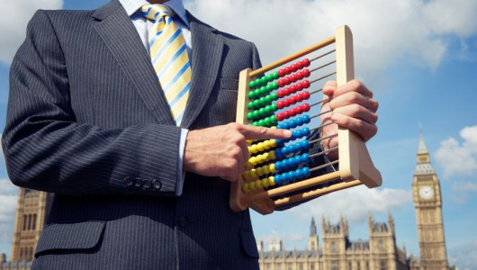 Returning Officer Holds Abacus at Houses of Parliament