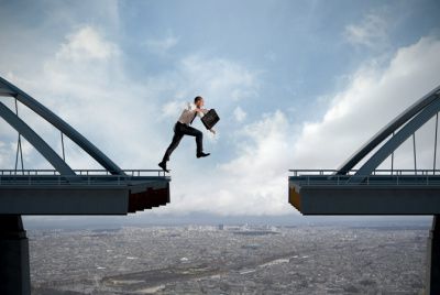 Businessman-Bridge-Jump-Leap-Business-700-400x268.jpg